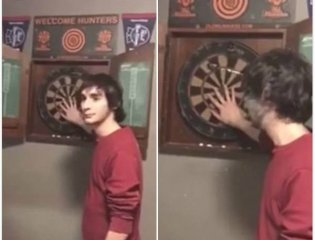 美一男子让醉酒朋友掷飞镖 不料射中自己